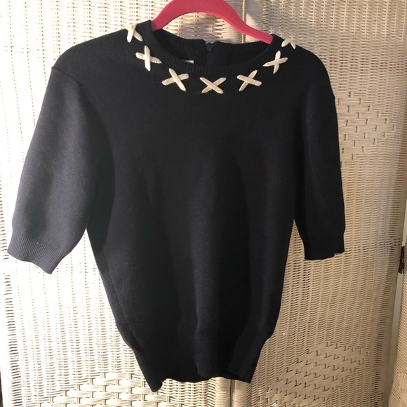 Tory Sports Navy sweater so Designer on point.